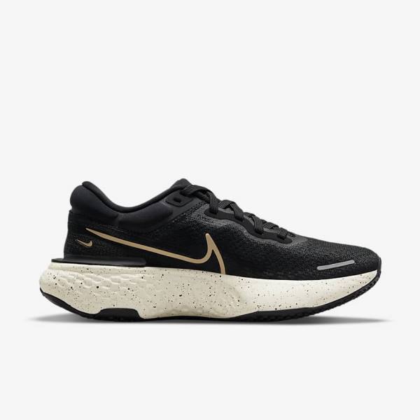 Zapatillas Running Nike ZoomX Invincible Run Flyknit Carretera Mujer Negras Metal Doradas | NK506ULE