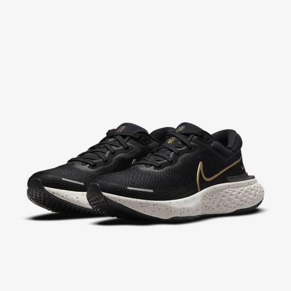 Zapatillas Running Nike ZoomX Invincible Run Flyknit Carretera Hombre Negras Metal Doradas | NK608FAQ